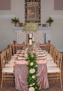 The bridal party table with the Bride and Groom heading the table.  Love this idea!